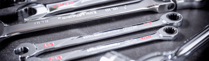 GEARWRENCH 120XP ratcheting wrenches sitting on top of a rolling cabinet